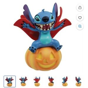 Disney Stitch Figure with Red Cape and Orange Pumpkin